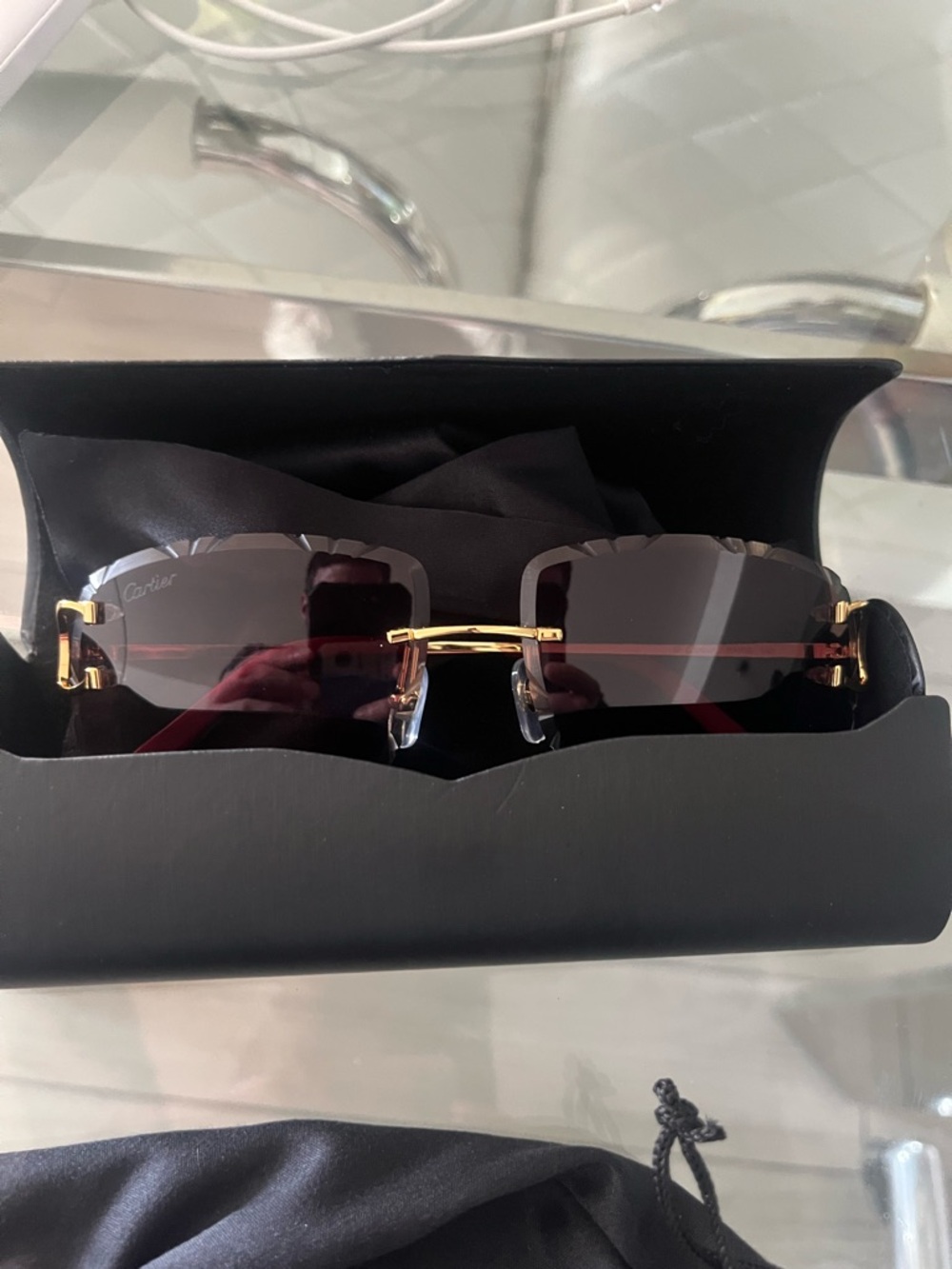 Cartier Rimless Sunglasses in Black and Gold